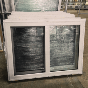A 47 inch x 35 inch single slider window with a white vinyl frame
