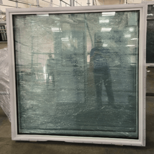 A 59" x 59" fixed window with a white virgin vinyl frame