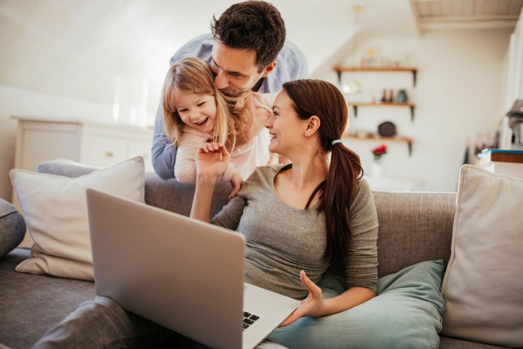 Homeowners reviewing window and door financing options online