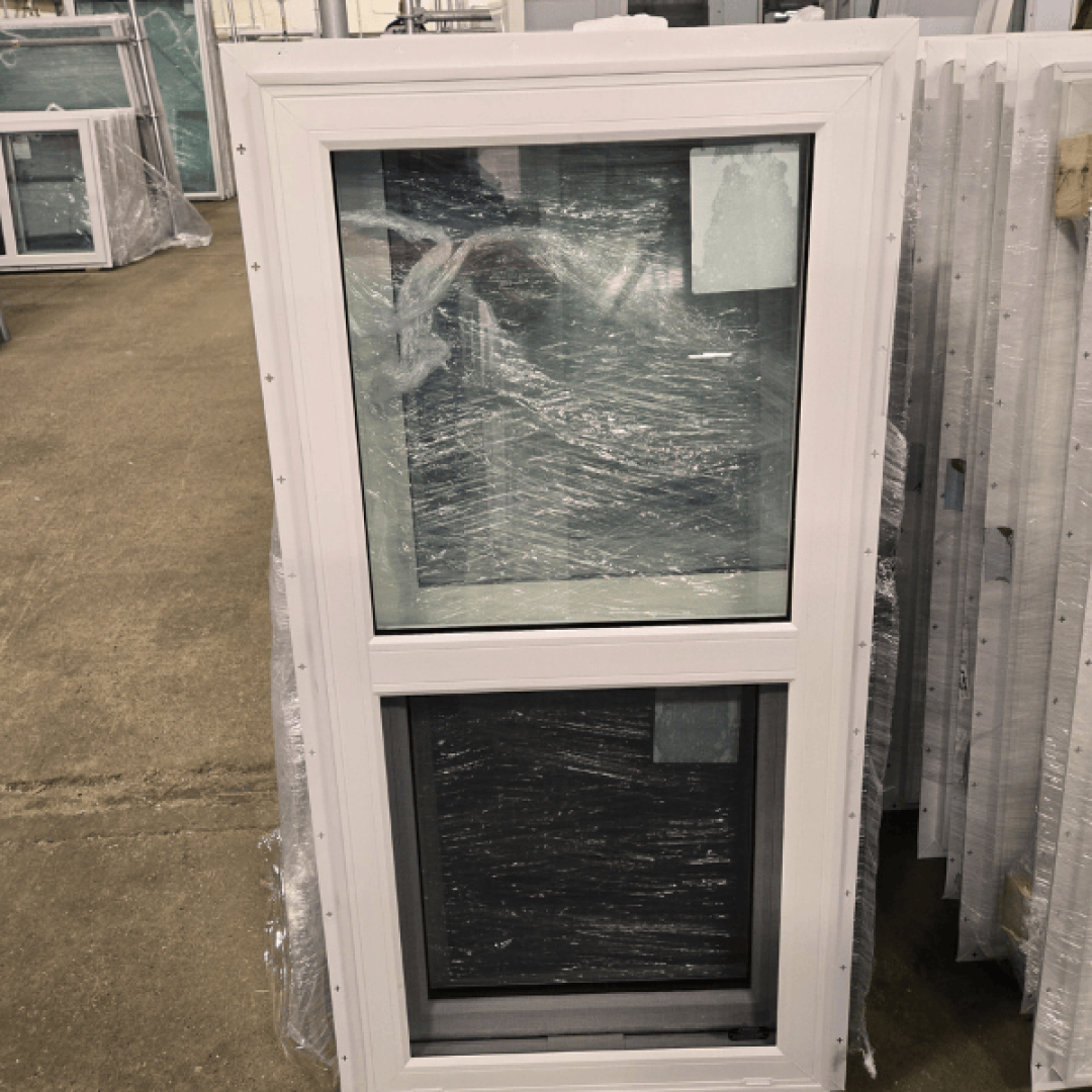 A 22" x 47" single hung window with a white virgin vinyl frame